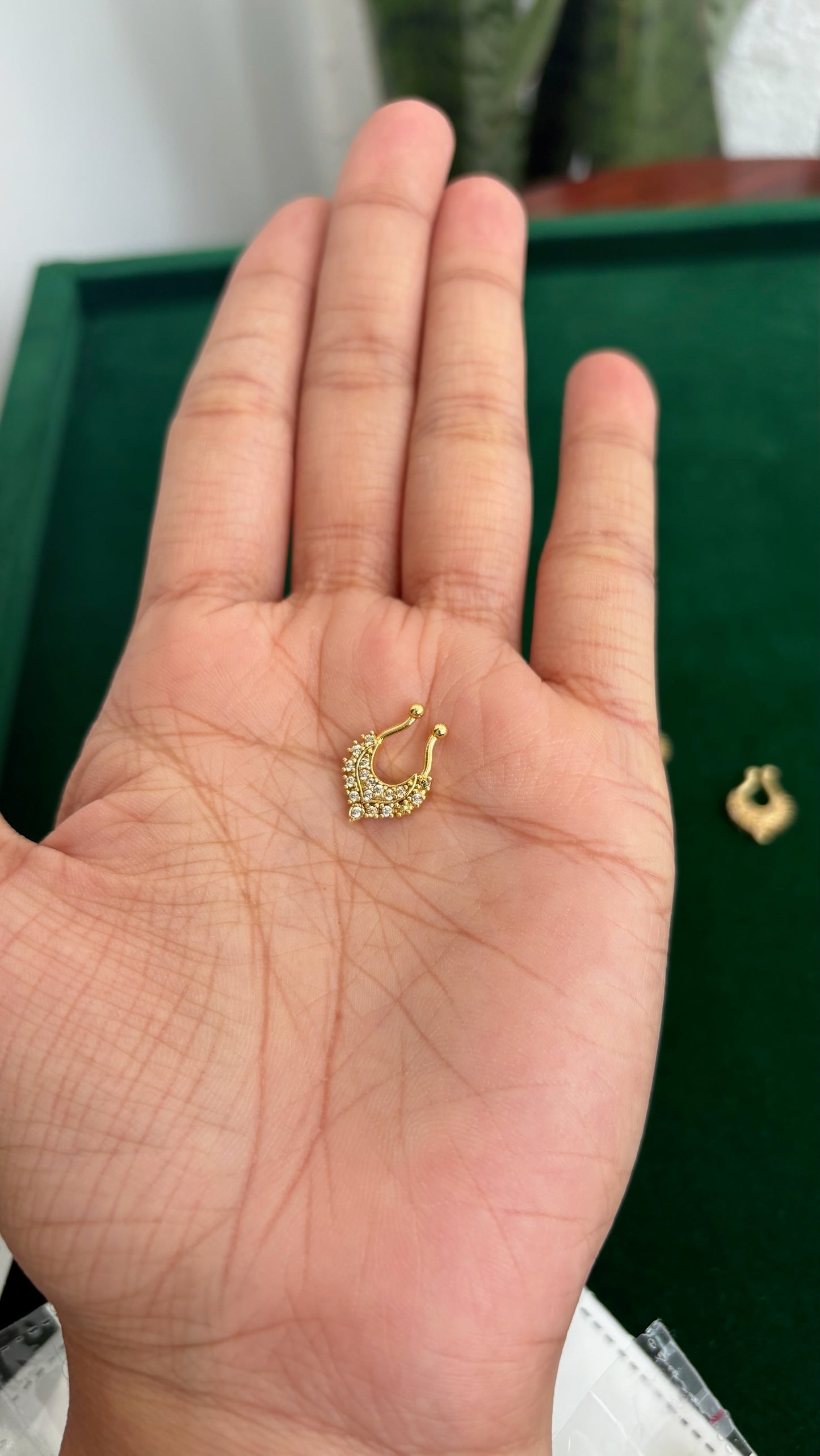 Gold finish septum ring with stones
