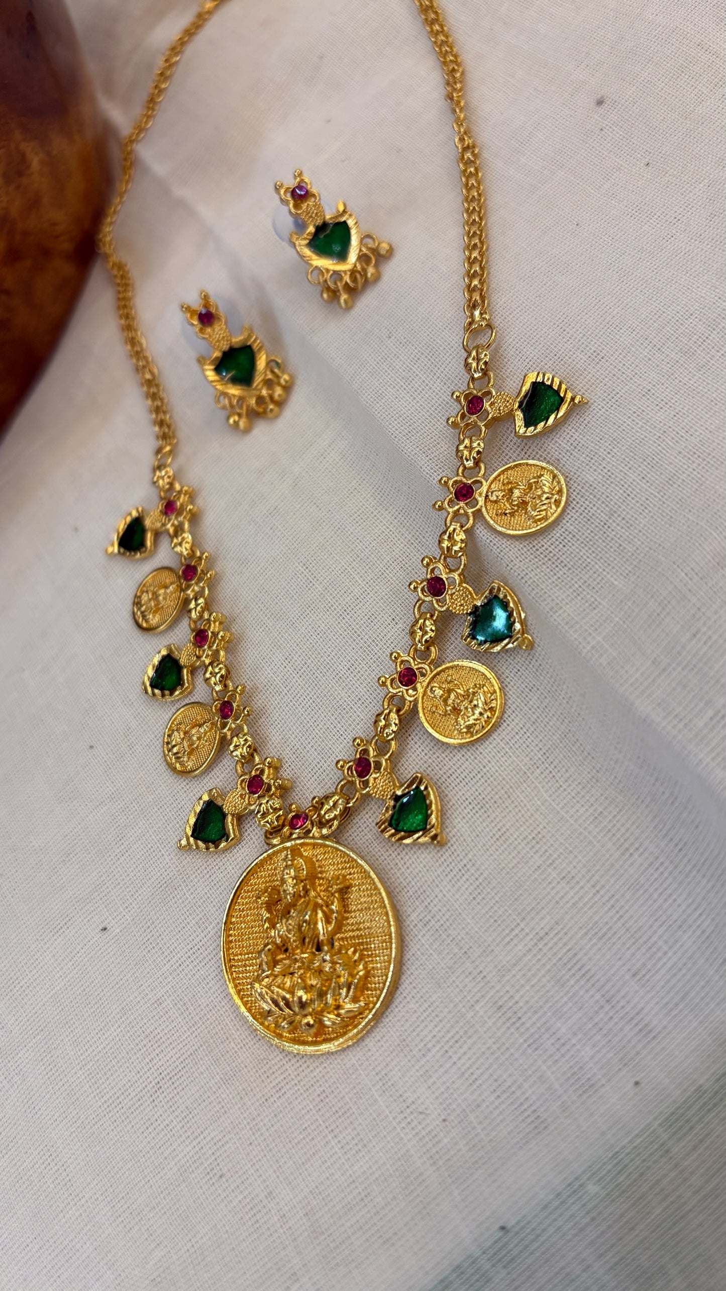 Palakka gold replica with coin