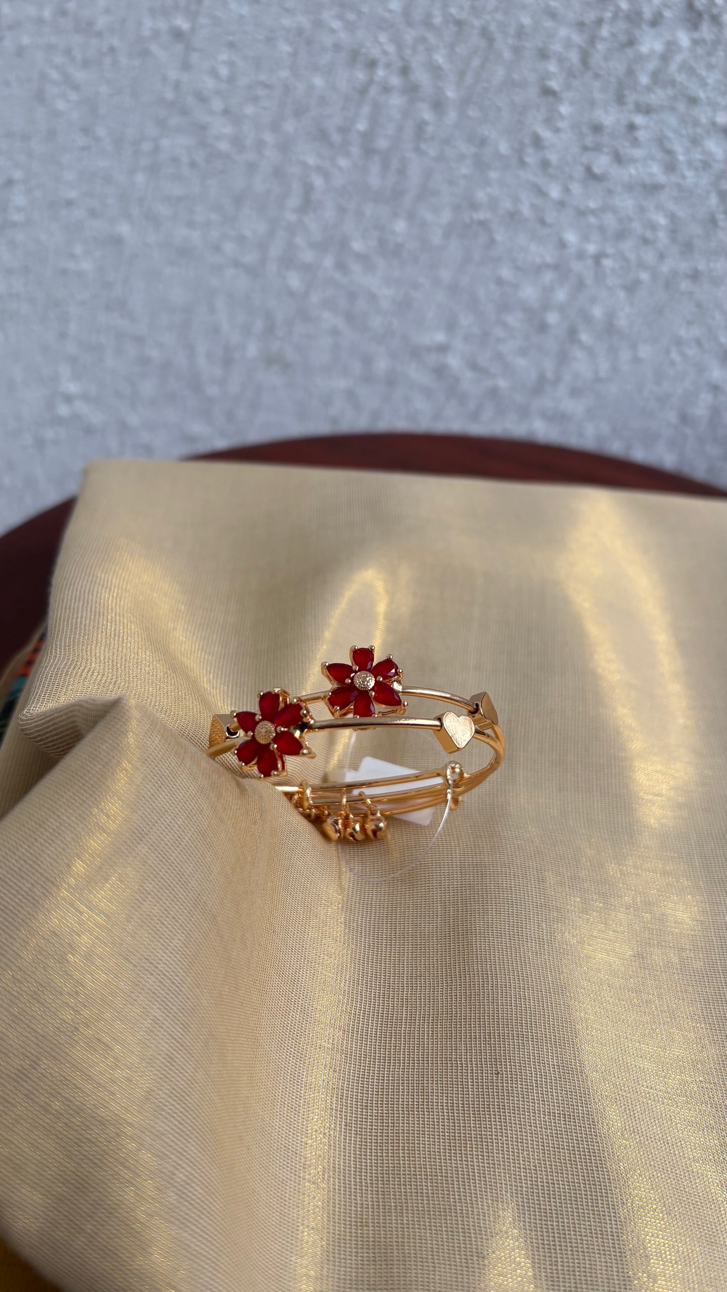 Viral red flower bangles with gold center (set of 2)