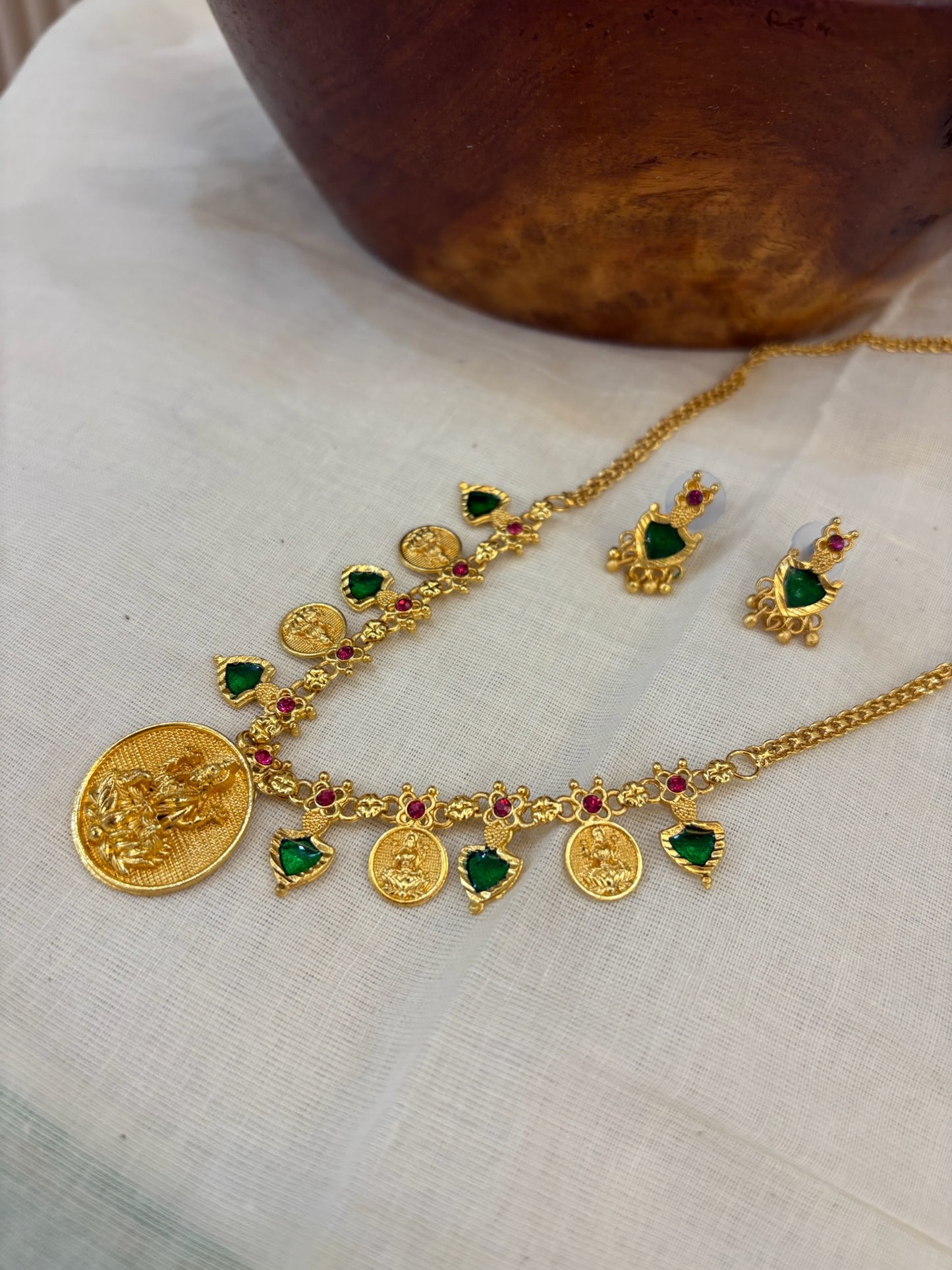 Palakka gold replica with coin