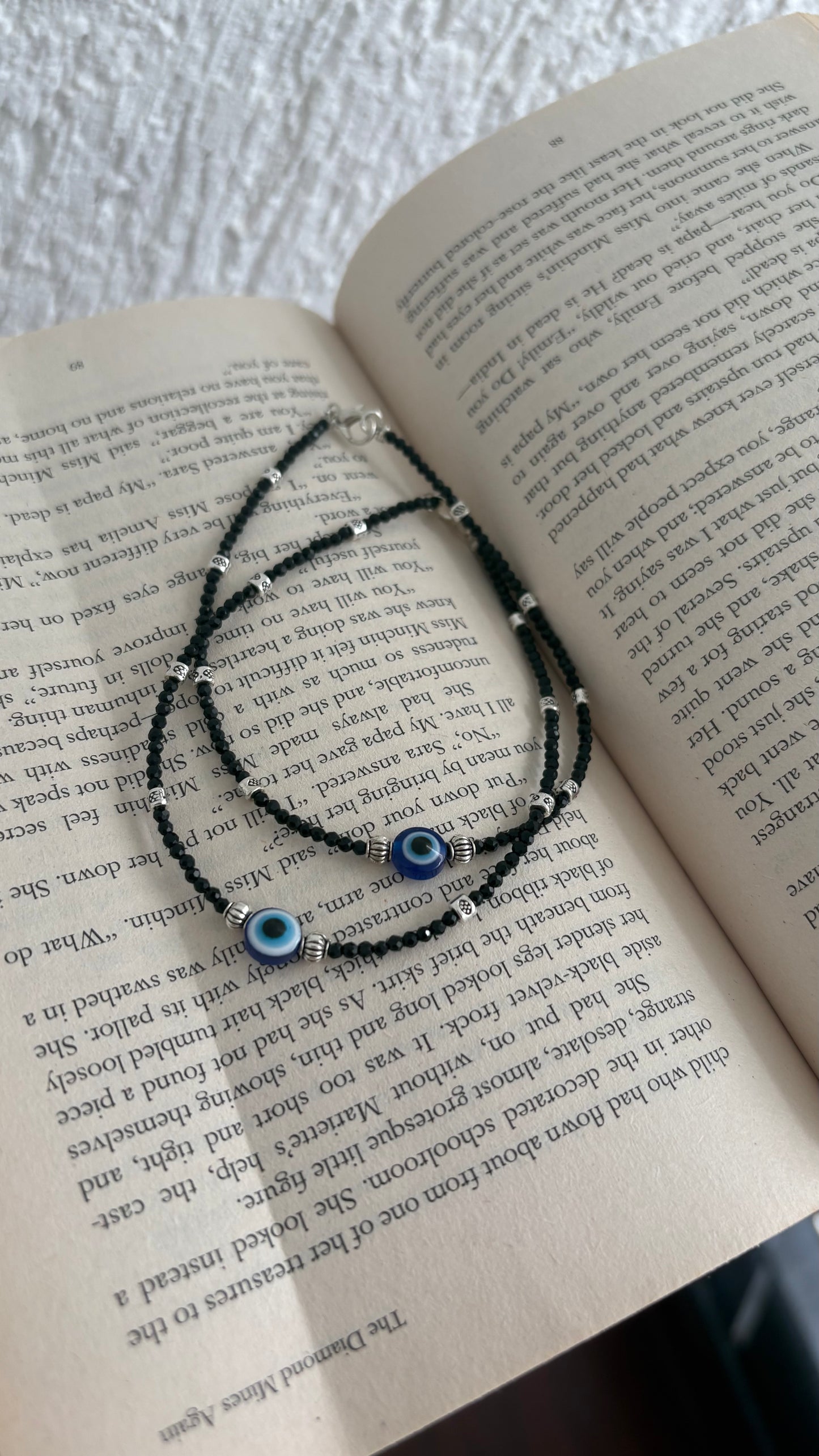 Evil eye anklet (both legs)