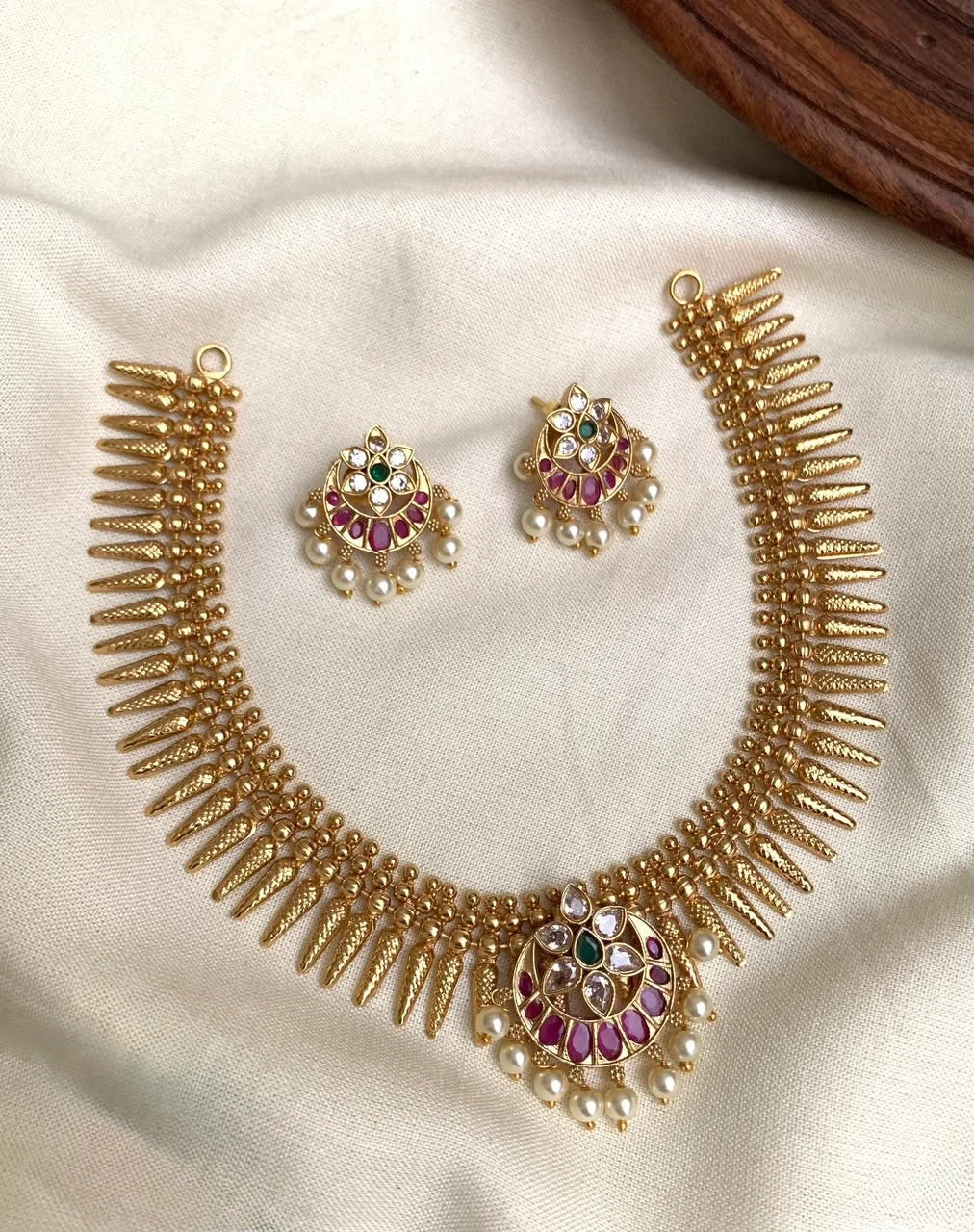 Gold replica Mullamuttu necklace
