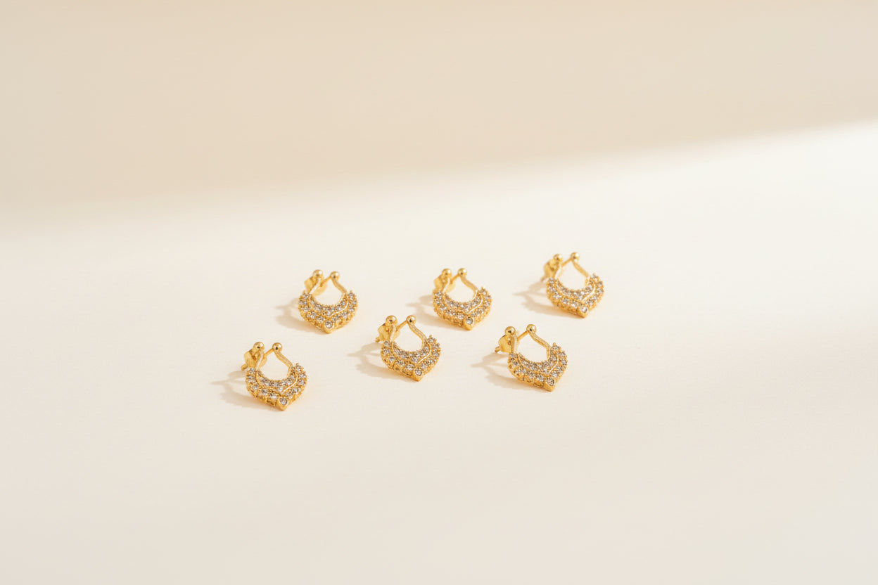 Gold finish septum ring with stones