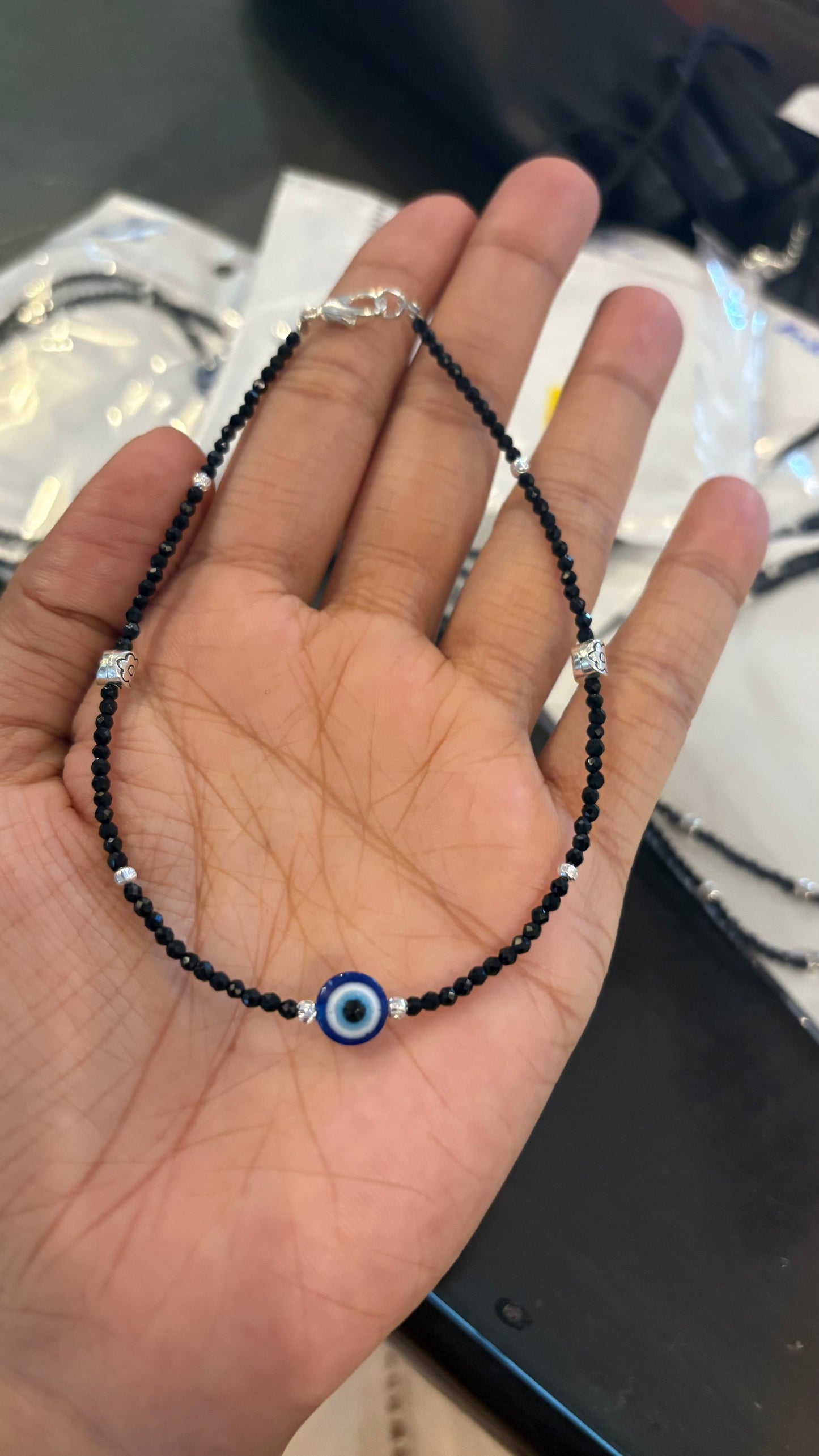 Evil eye anklet (both legs)