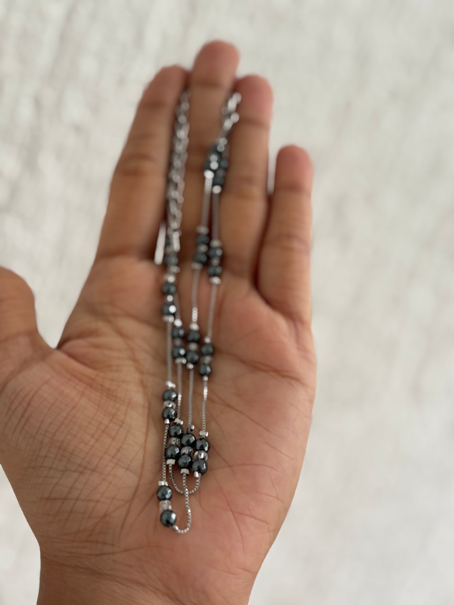 Anklet black bead (both leg)