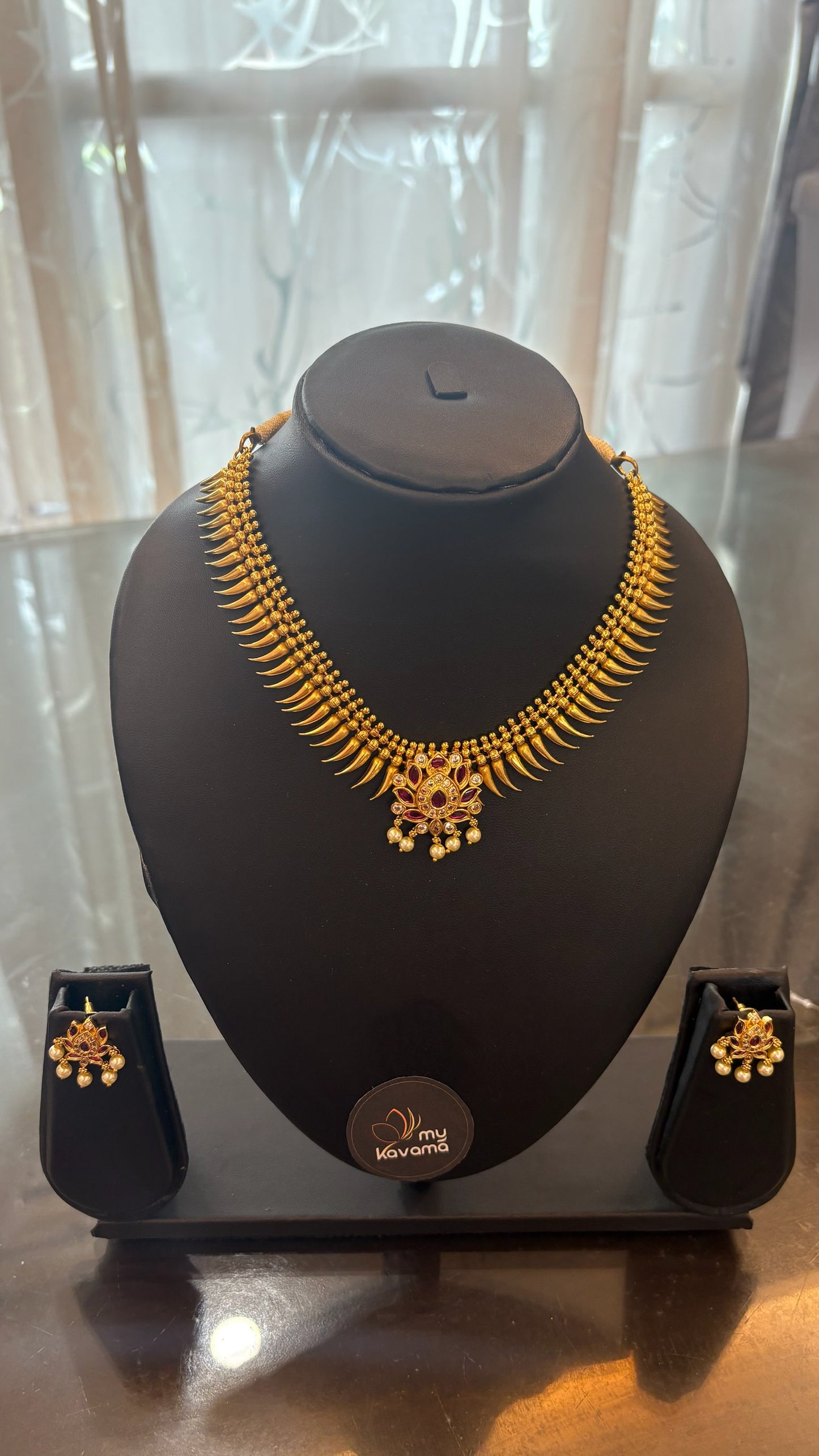 Gold replica Mullamuttu necklace