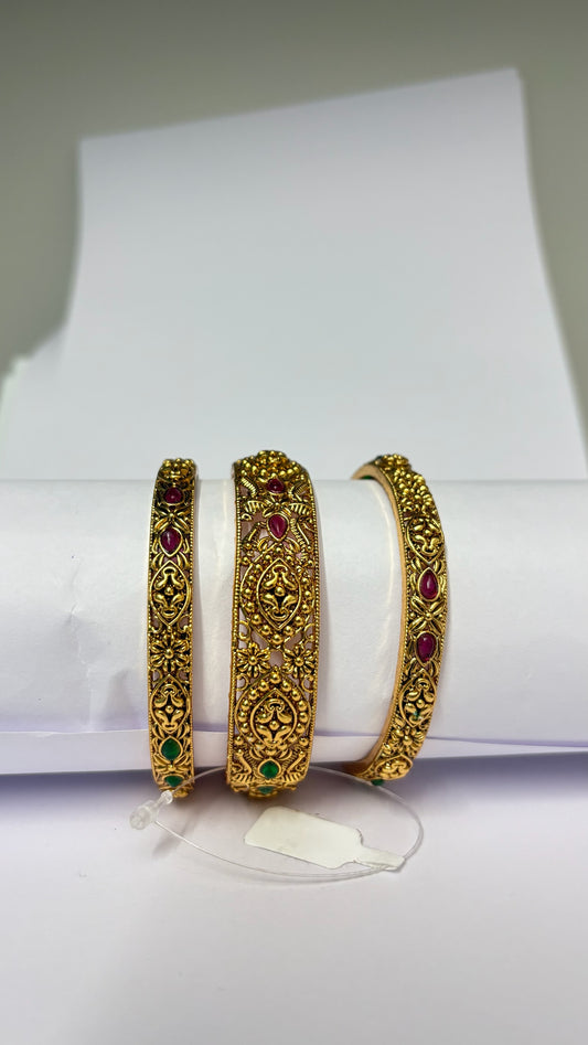 Non idol ruby and emerald bangles(set of 3)
