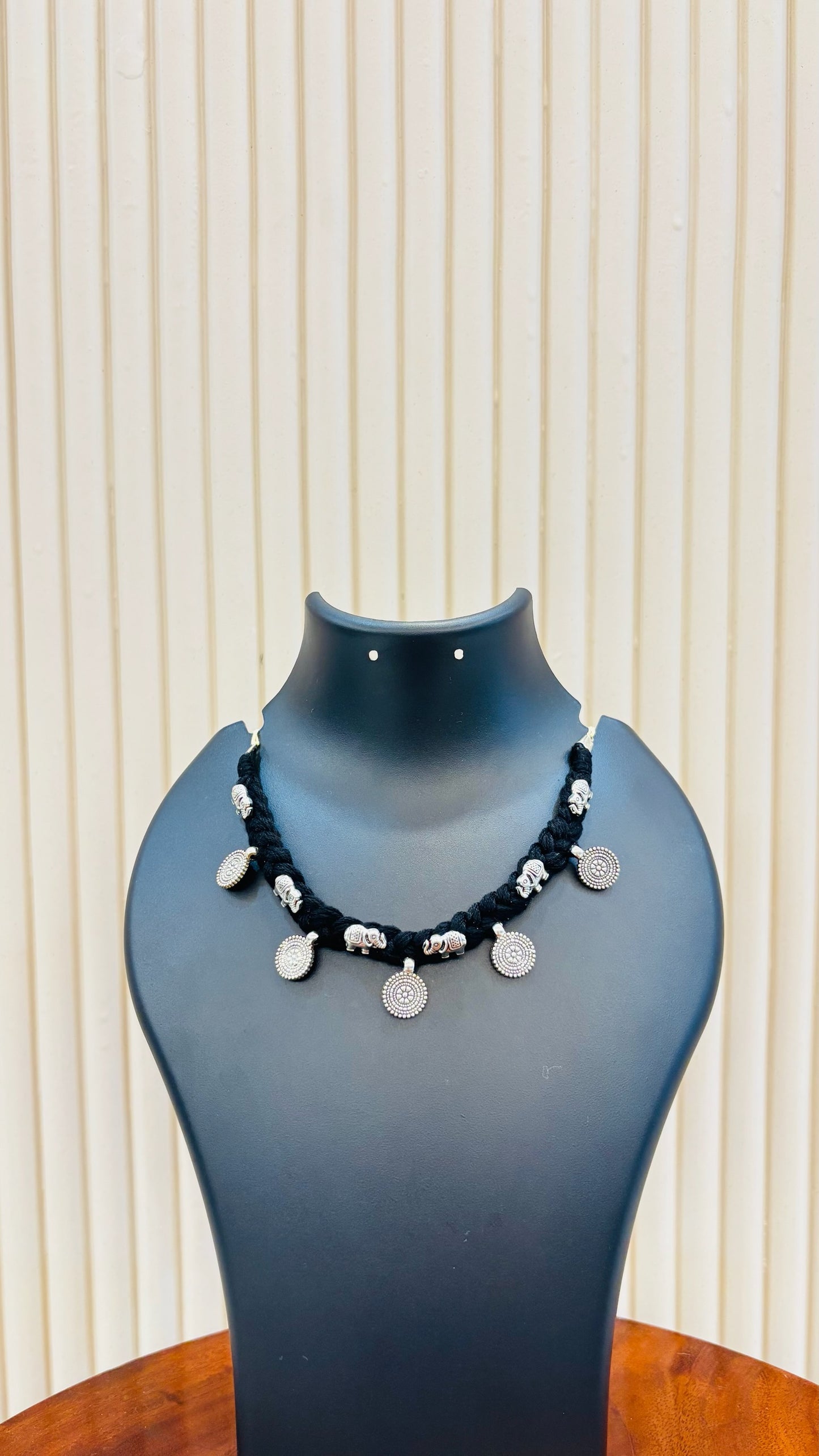 Braided elephant necklace